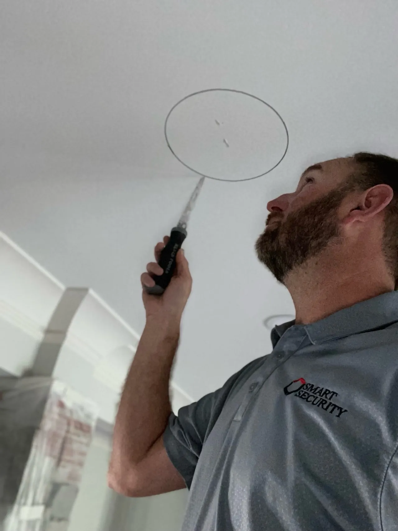 Clean ceiling cutout for in-ceiling speaker installation.